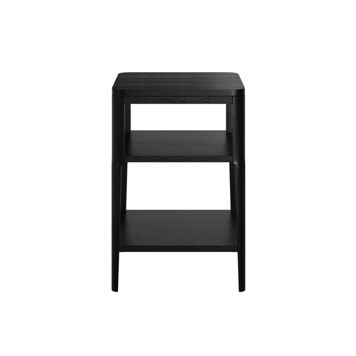 Black side table with two shelves on a white background
