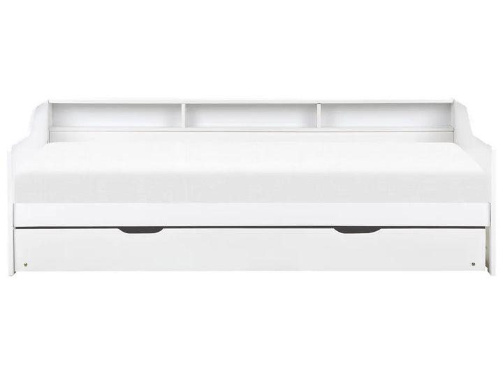 White bed with storage drawers on a white background