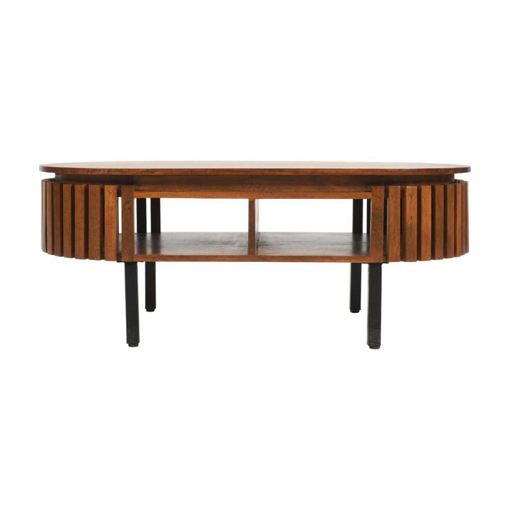 A rectangular slatted coffee table made of dark mango wood with an open shelf in the center, featuring rounded corners and black metal legs.