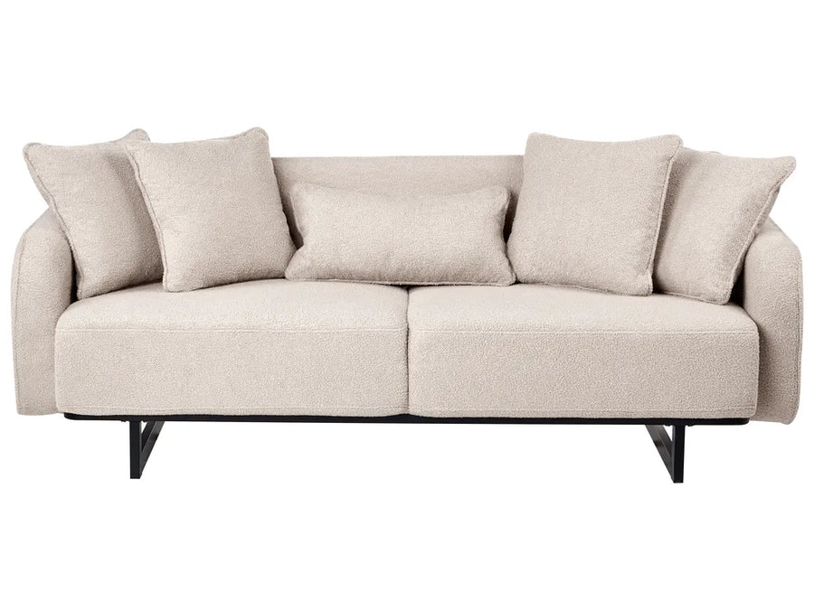 A modern two-seater sofa upholstered in a textured light beige fabric, featuring five matching throw pillows and a black metal frame with angled legs, shown against a plain white background.