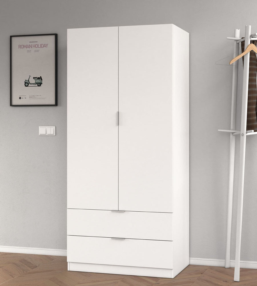 White wardrobe with a coat rack and framed picture on a gray wall.