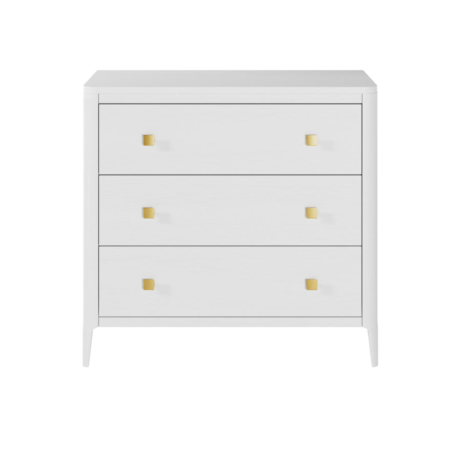 White dresser with gold knobs on a white background