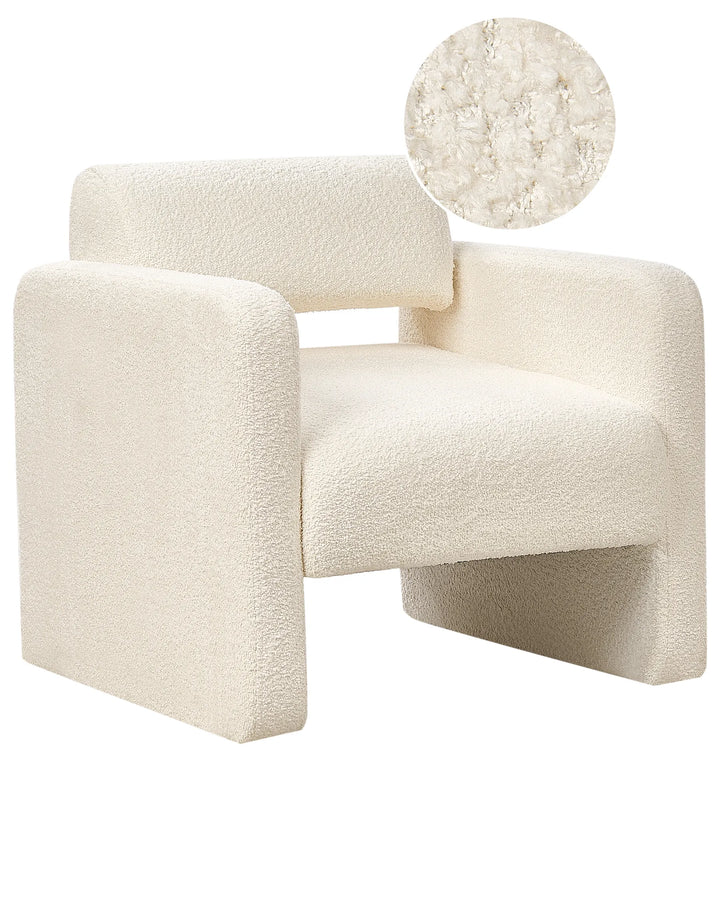 Cream-colored armchair with a close-up of the fabric texture on a white background