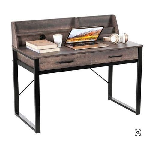 Wooden desk with laptop, books, and cups on a white background