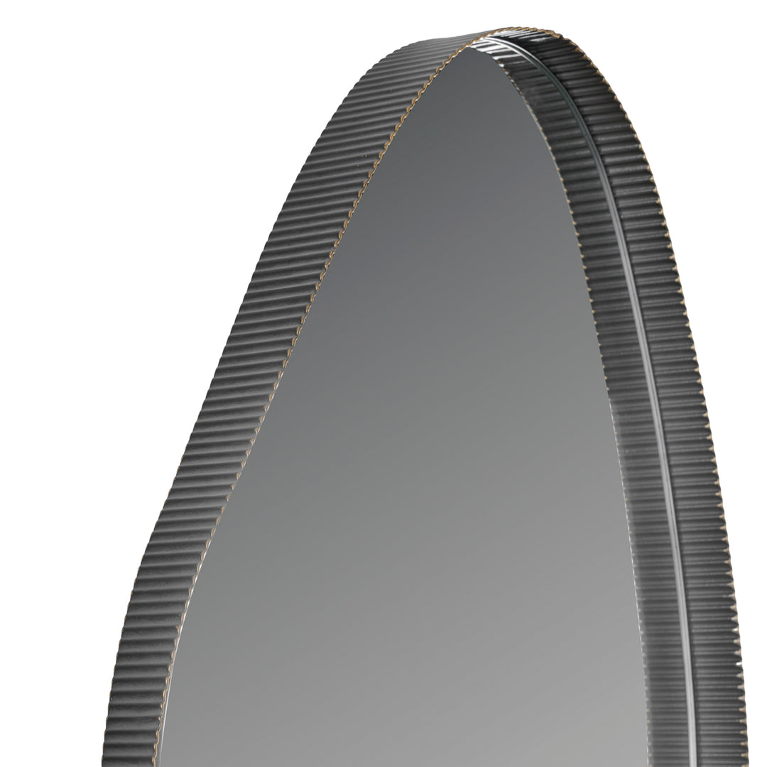 Close-up of a belt with teeth on a white background