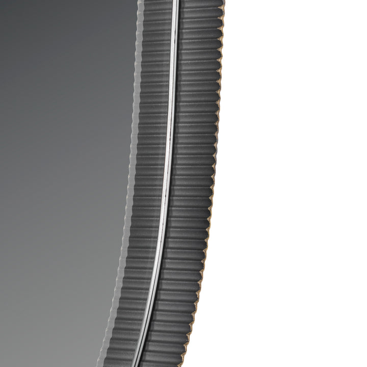 Close-up of a ribbed black tire on a white background
