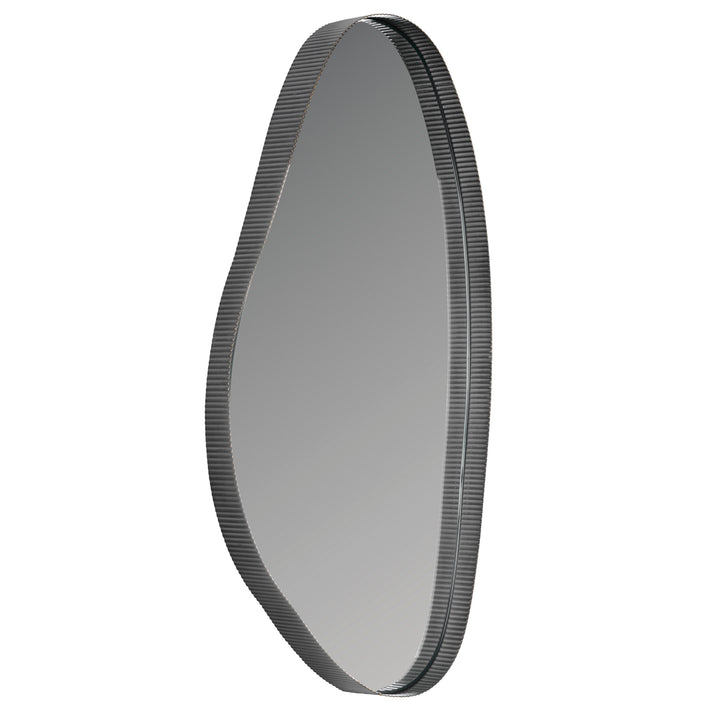 Round metallic object with a textured rim on a white background