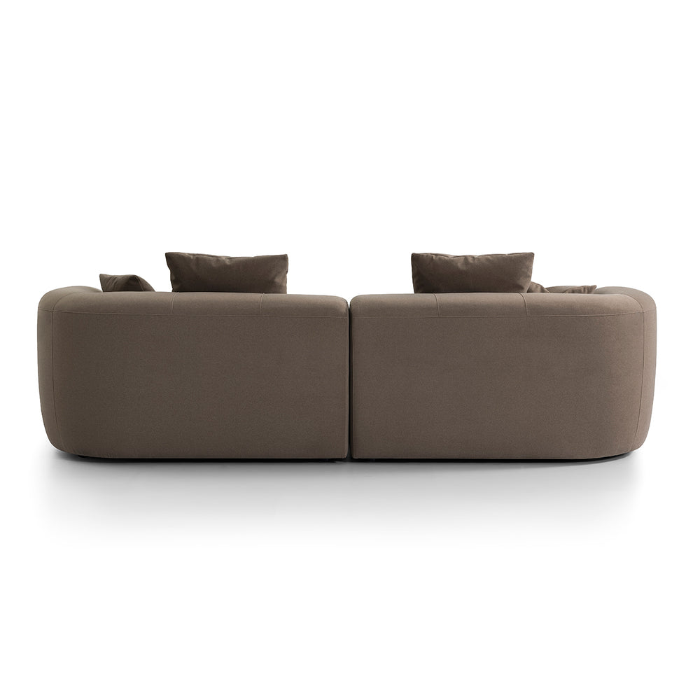 Gray sofa with two cushions on a white background