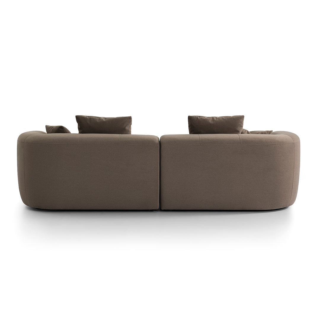 Gray sofa with two cushions on a white background