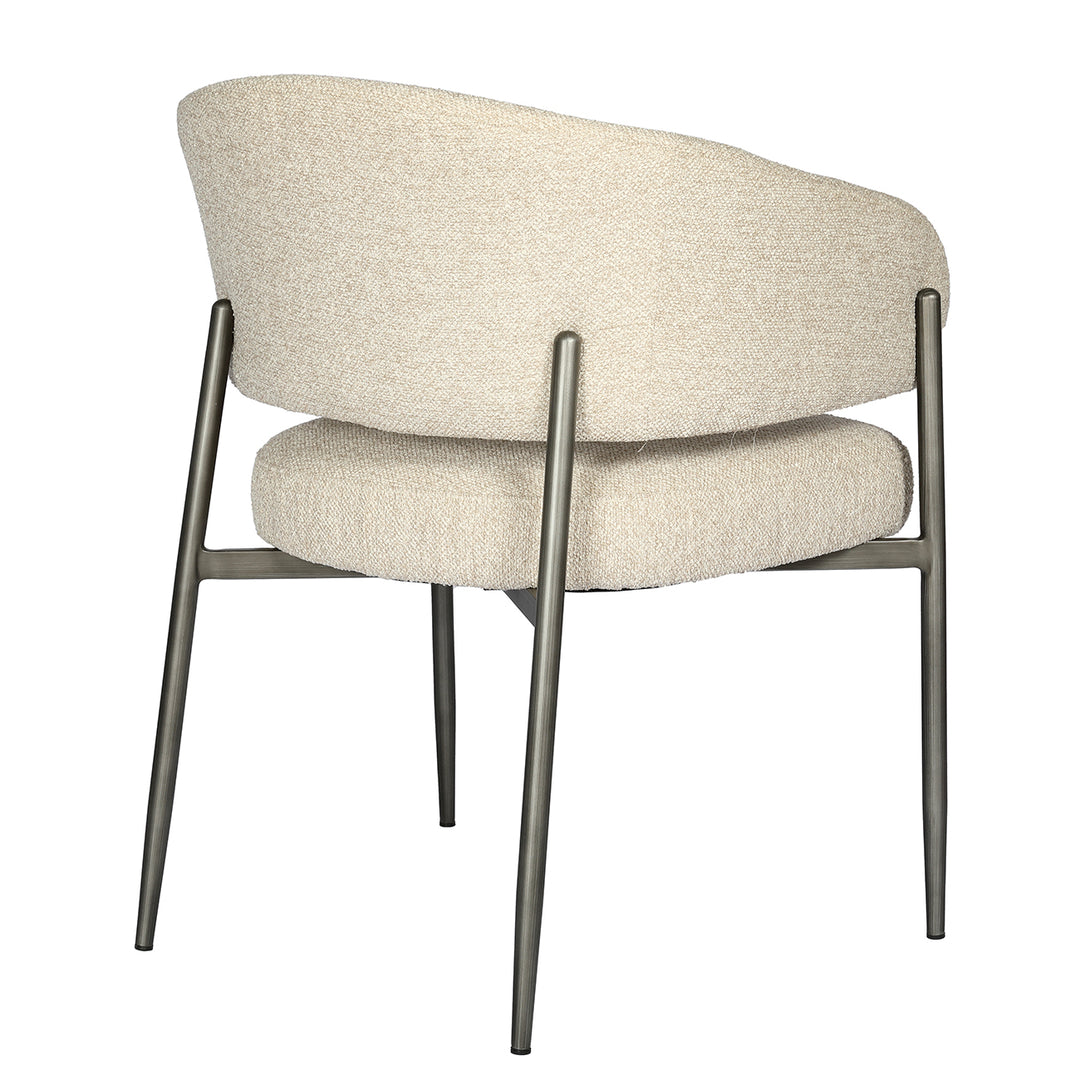 Beige armchair with metal legs on a white background