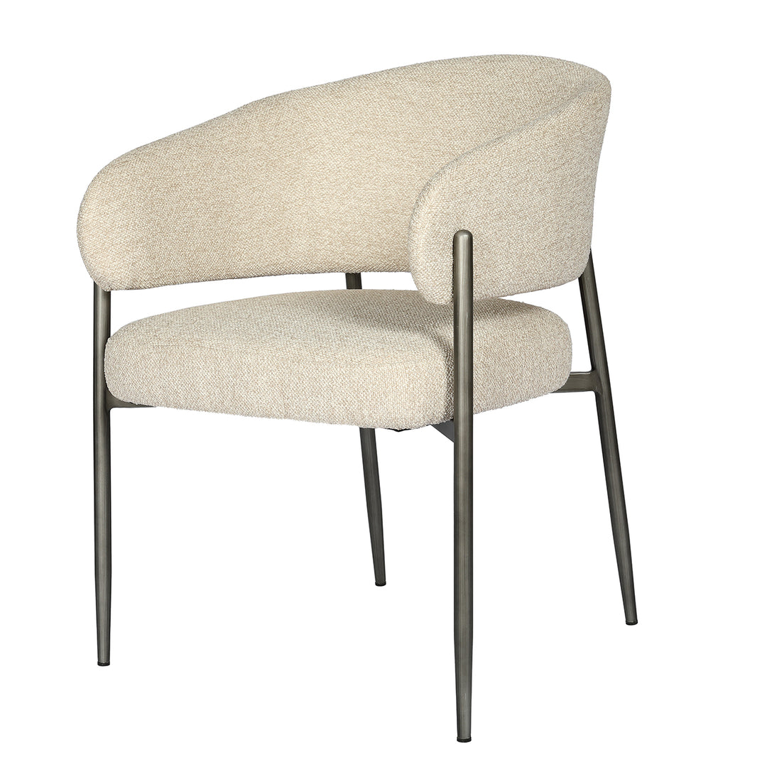 Beige upholstered chair with metal legs on a white background