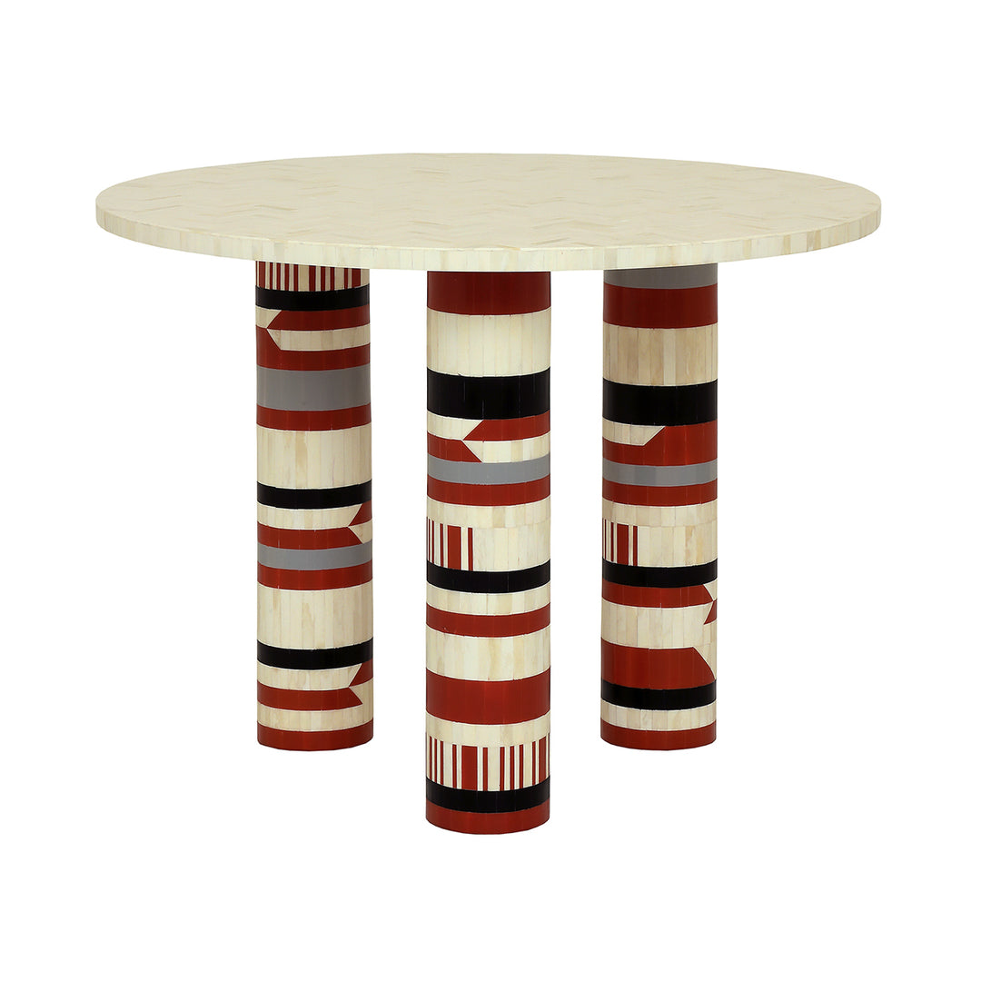 Round table with patterned legs on a white background