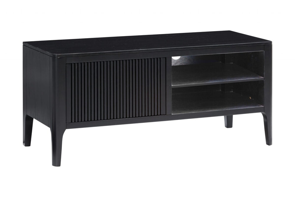 Black TV stand with a slatted door on a white background