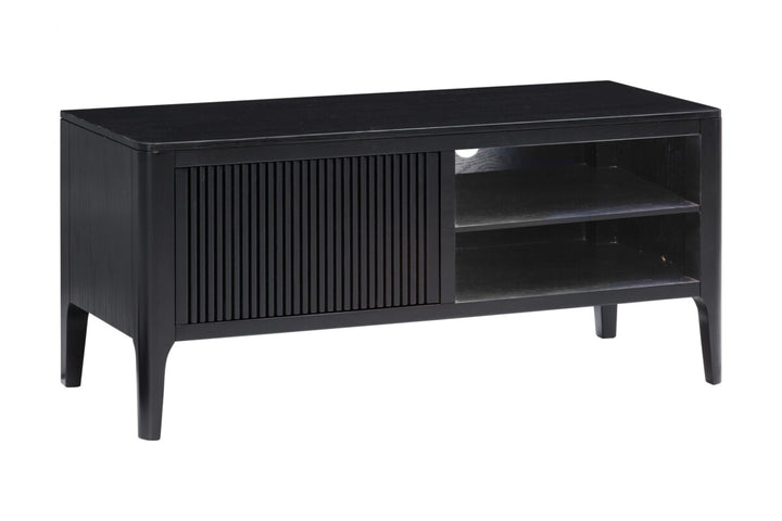 Black TV stand with a slatted door on a white background