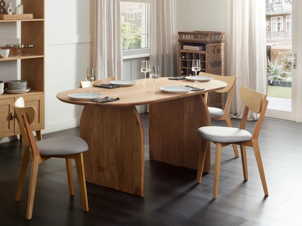 Wooden dining table with chairs in a modern kitchen setting