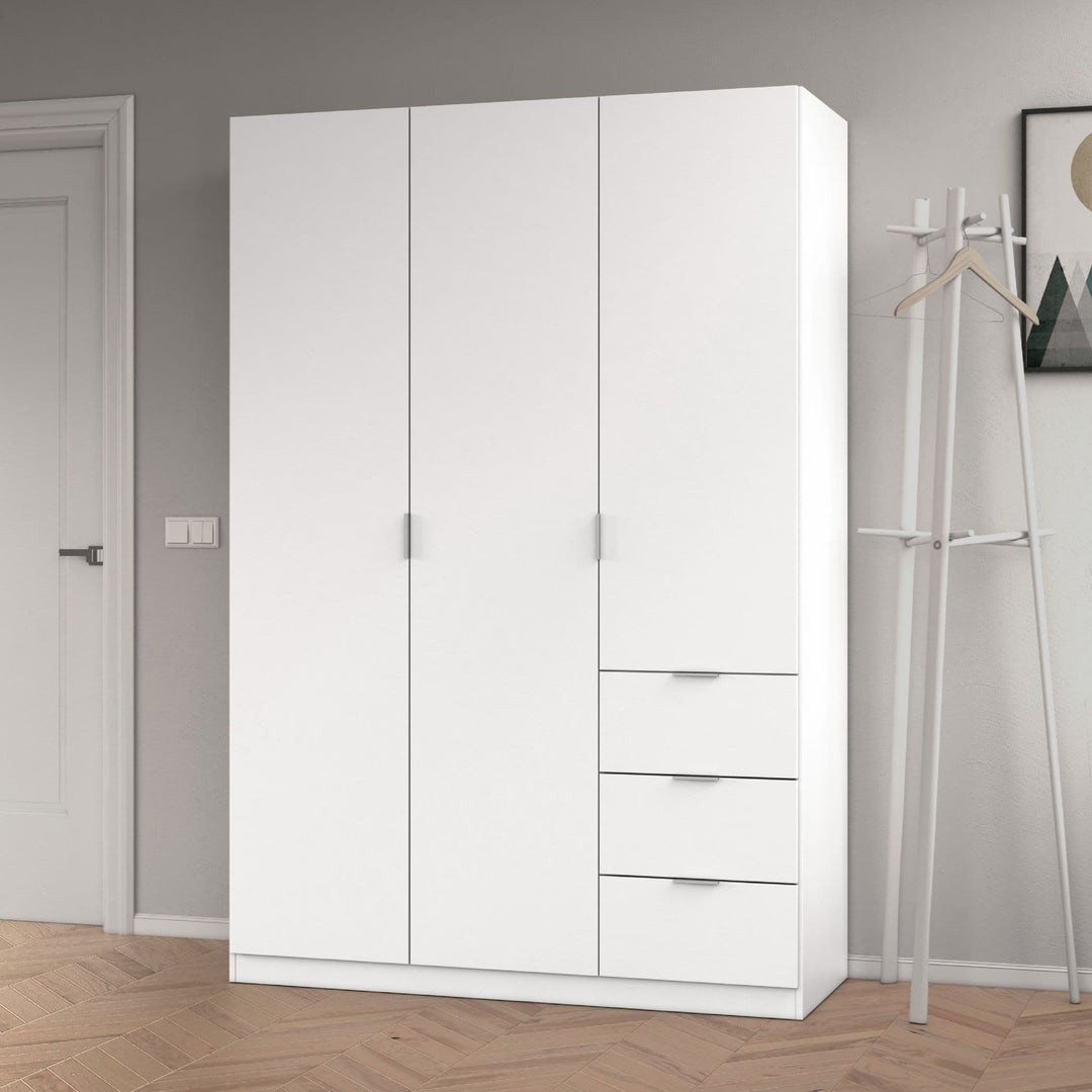 White wardrobe with drawers in a room with a coat rack and framed picture on the wall.