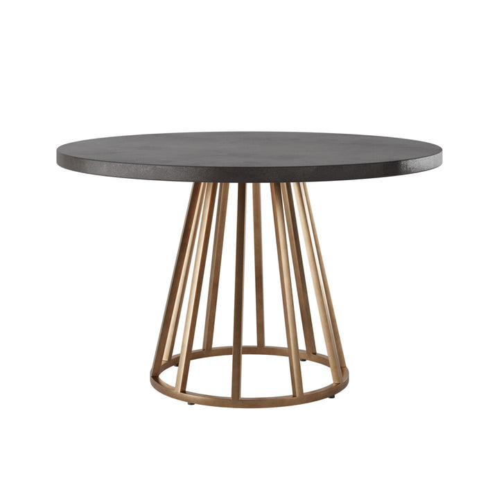 Round table with dark top and gold metal base on a white background