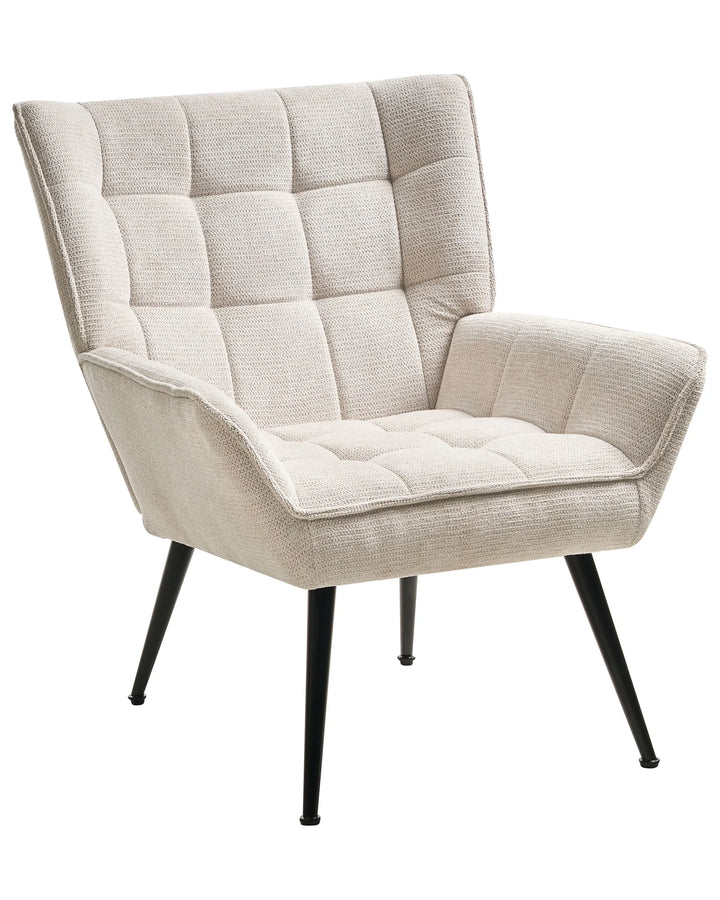 Beige armchair with quilted design on a white background