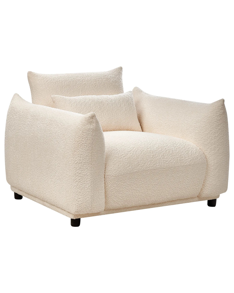 White textured armchair with cushions on a white background