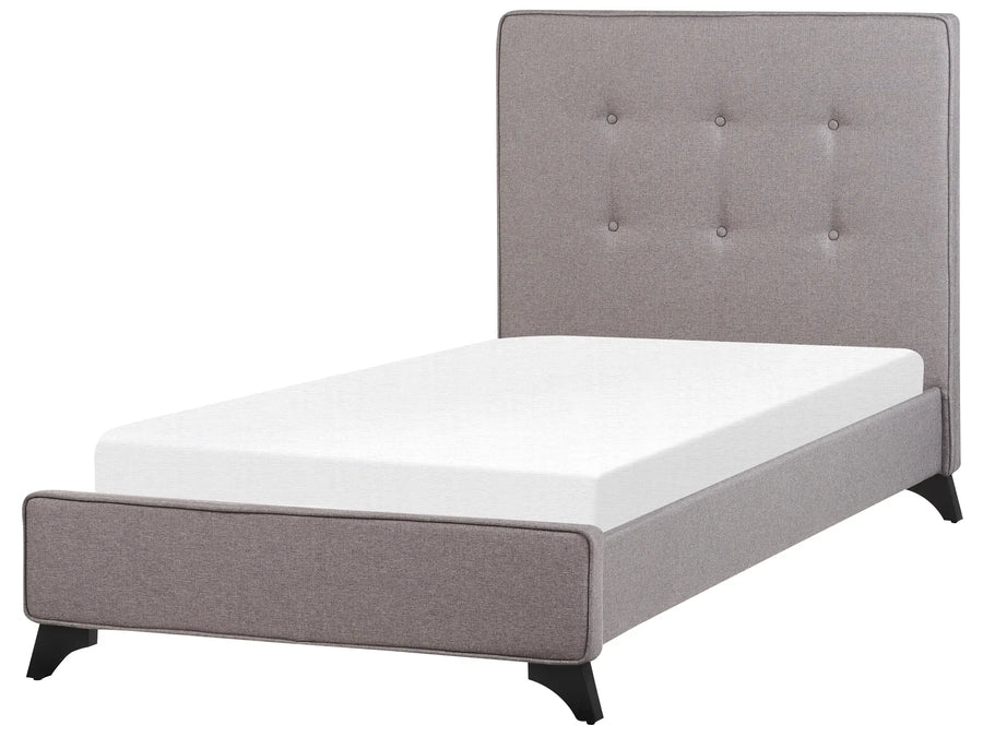 Gray upholstered bed with white mattress on a white background