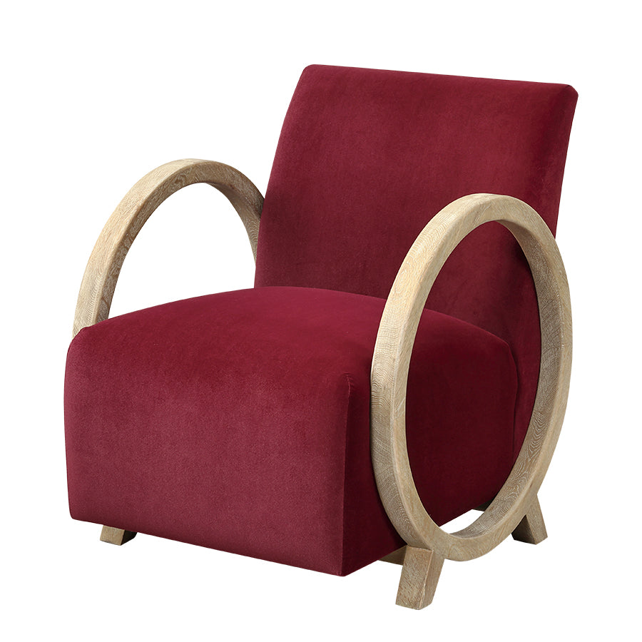 Red armchair with wooden circular armrests on a white background