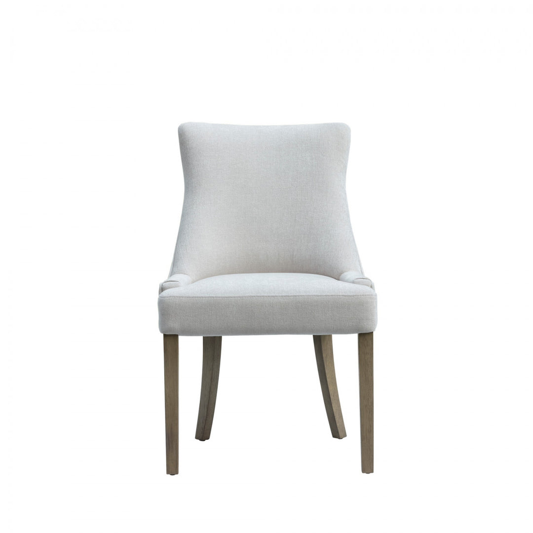 Light gray upholstered chair with wooden legs on a white background