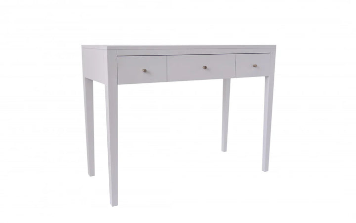 White desk with three drawers on a white background
