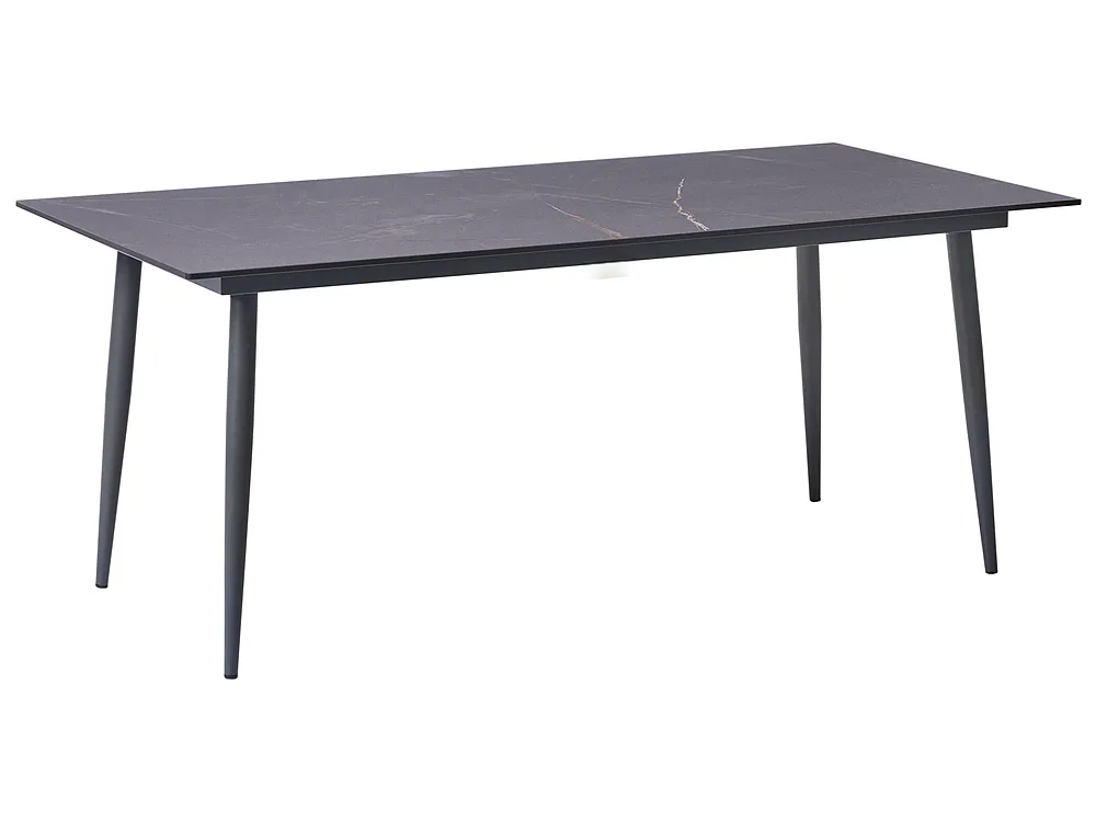 A rectangular dining table with a dark charcoal gray stone-look top featuring subtle white veining, supported by four tapered black metal legs, shown on a plain white background.