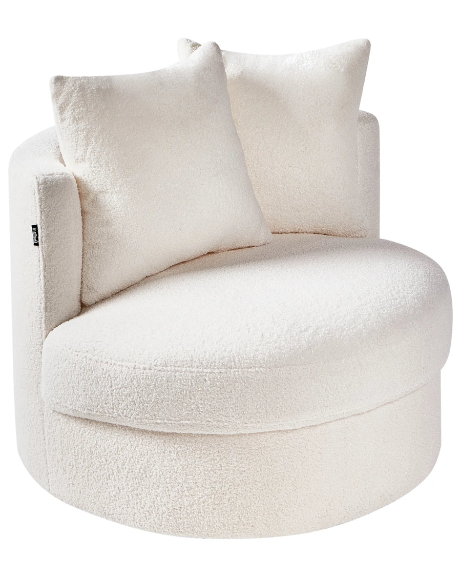 White plush armchair with cushions on a white background