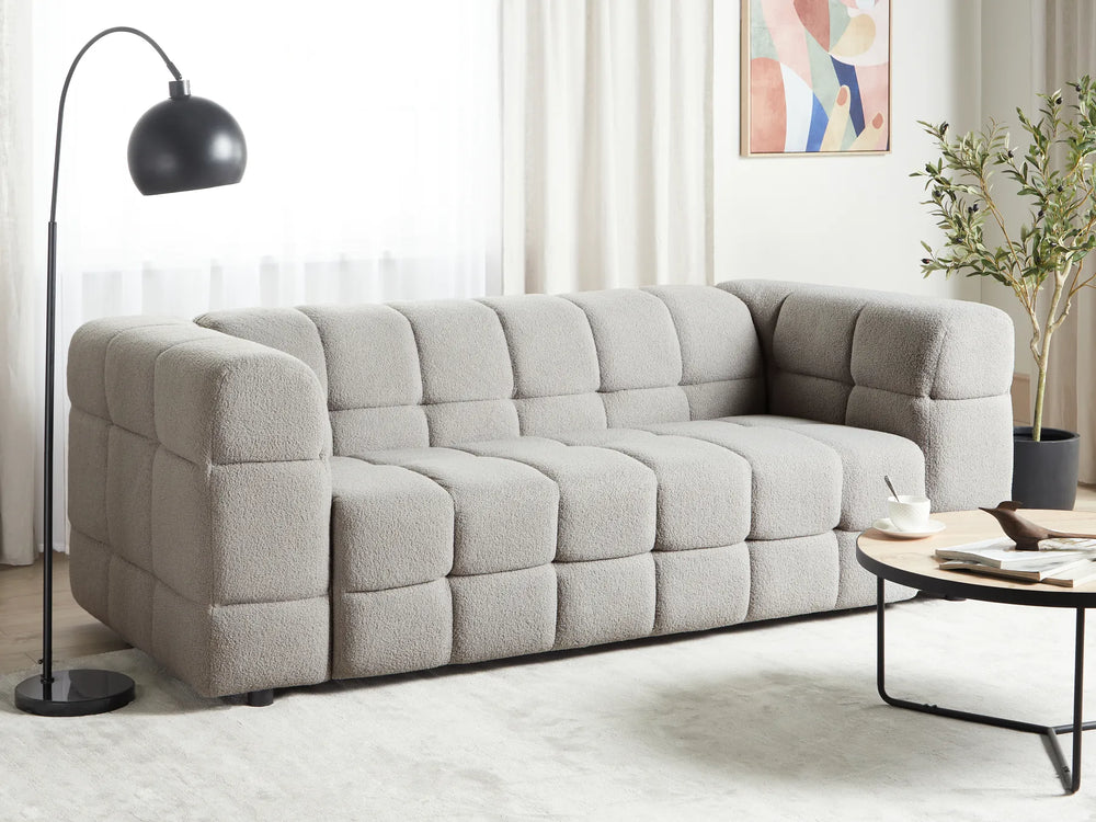 Grey bouclé 3 seater sofa with decorative stitching and thick cushions
