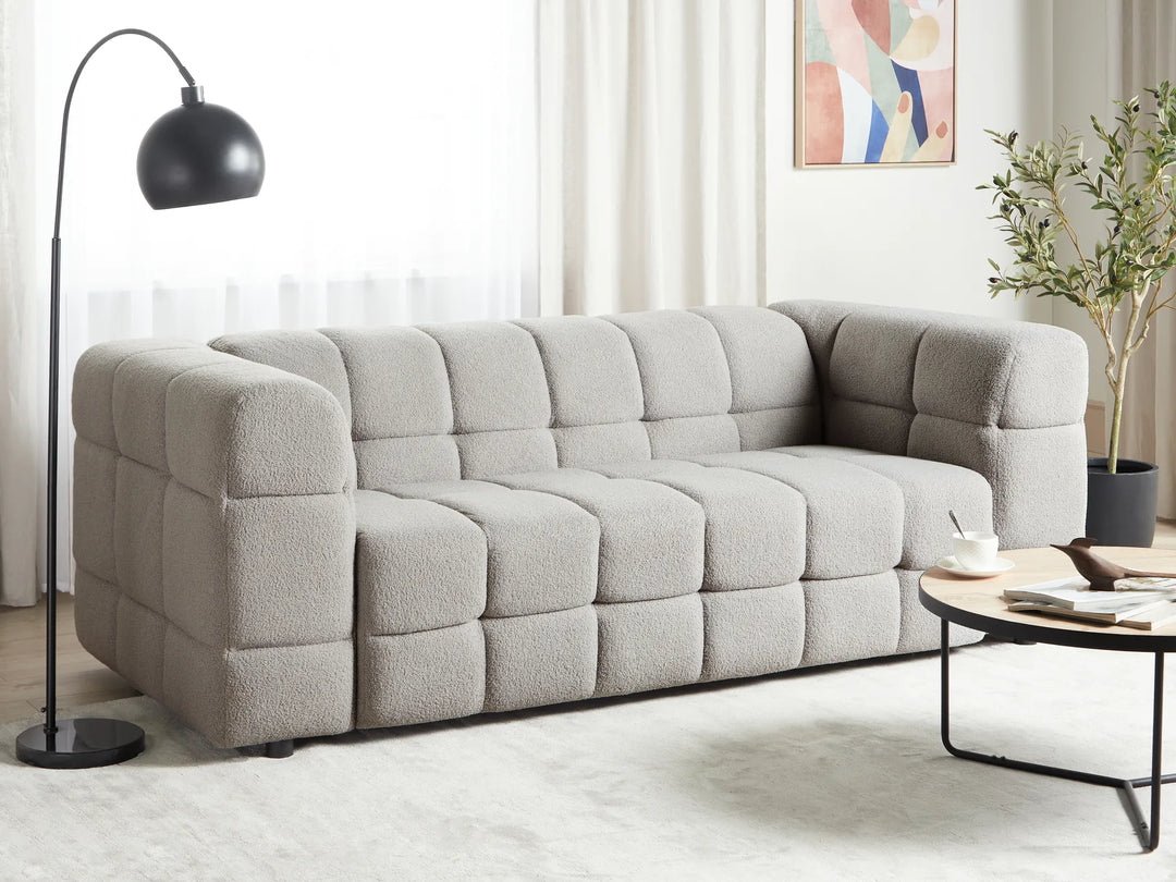 Grey bouclé 3 seater sofa with decorative stitching and thick cushions