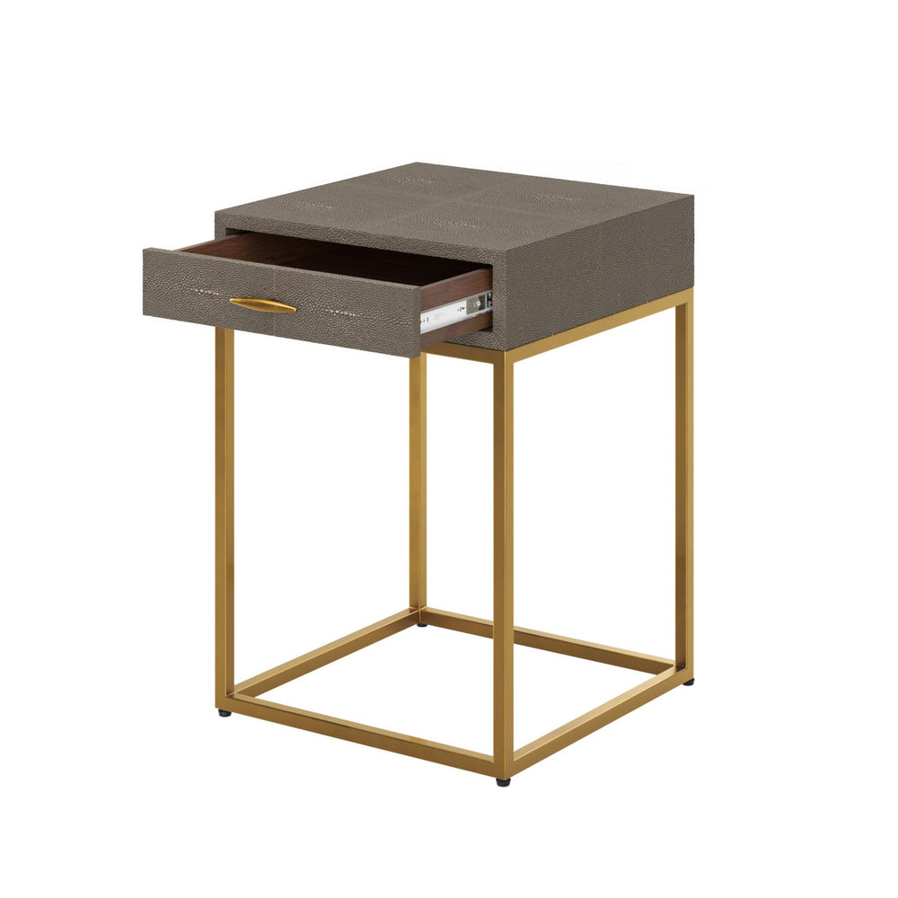 Side table with a drawer and gold frame on a white background