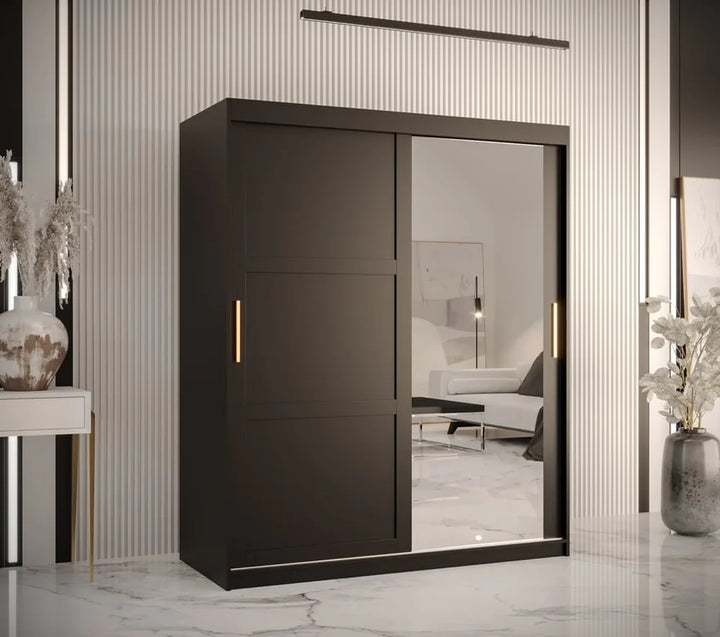 Modern dark brown wardrobe with sliding mirror door in a stylish room.