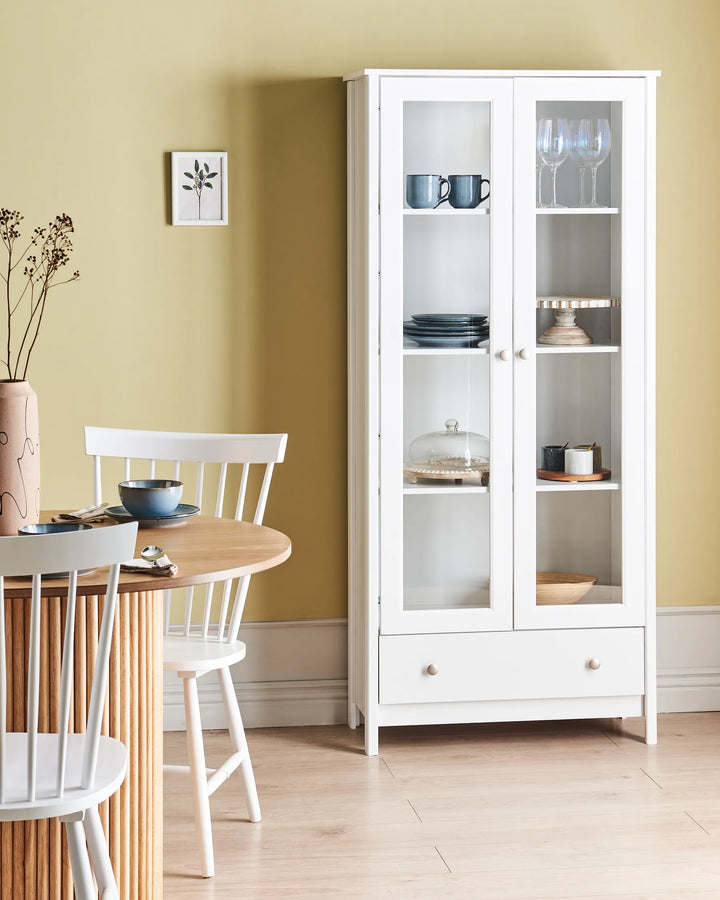 White glass-fronted cabinet