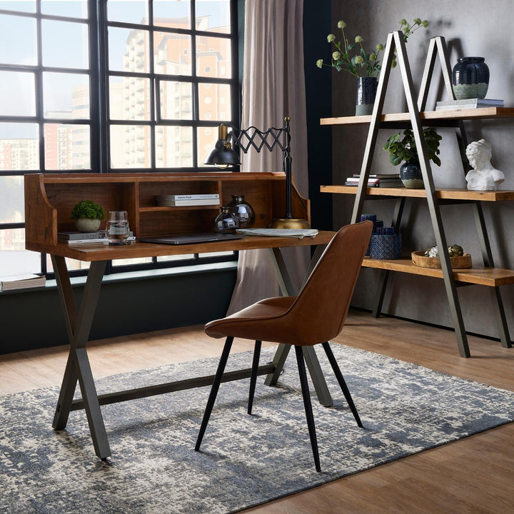 Modern home office with wooden desk, chair, and bookshelf.