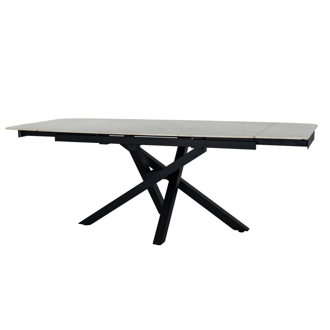 A modern rectangular dining table with a light gray stone or laminate top and a black metal extendable base, shown on a plain white background.