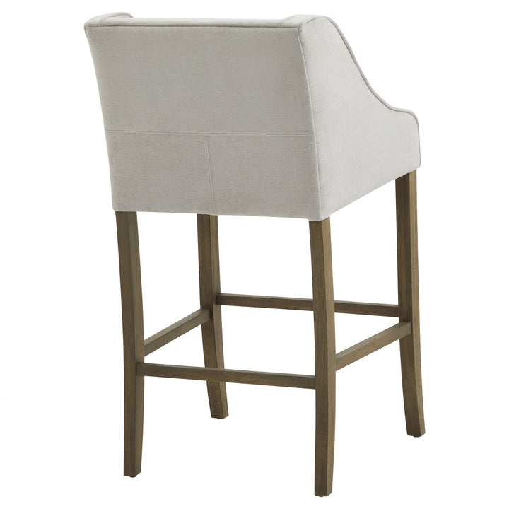 Bar stool with beige cushioned seat and backrest on a white background