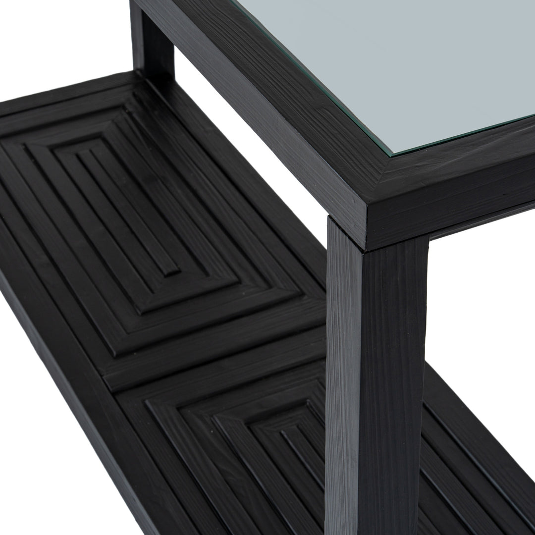 Black metal shelf with glass top on a white background