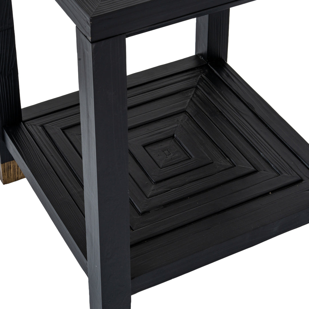 Black wooden step stool with a white background