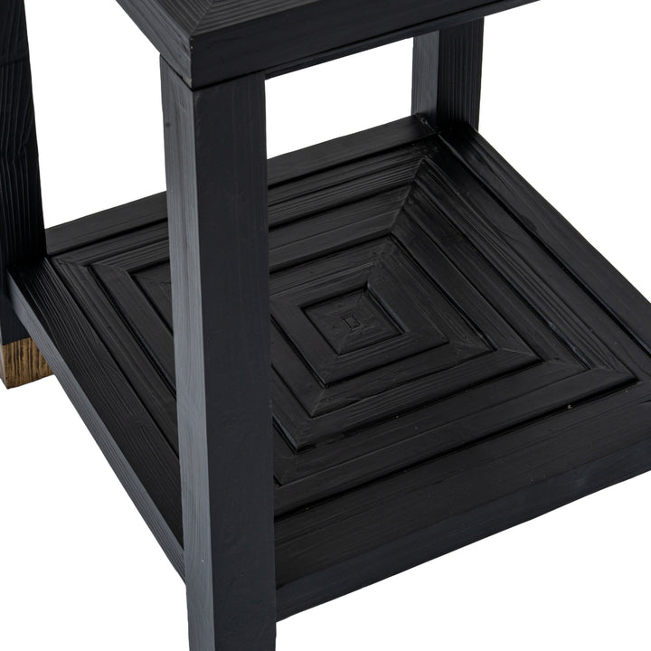 Black wooden step stool with a white background
