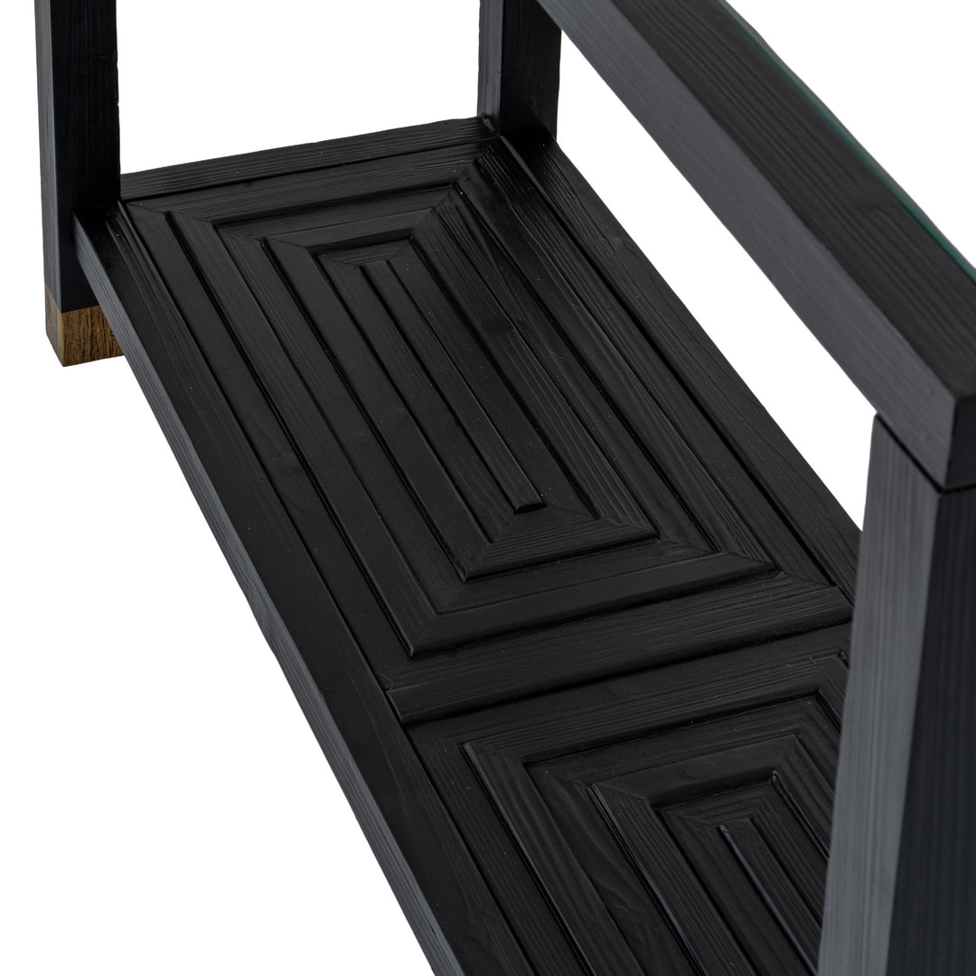 Black wooden step stool with a white background