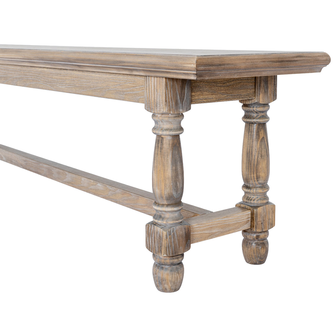 A rustic wooden bench with a weathered brown finish, featuring turned legs and a stretcher bar, shown against a plain white background.