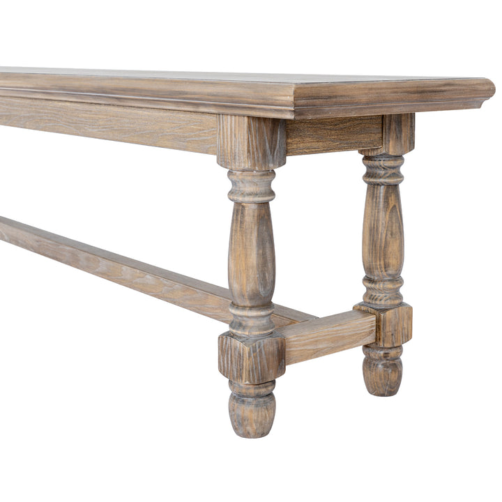 A rustic wooden bench with a weathered brown finish, featuring turned legs and a stretcher bar, shown against a plain white background.