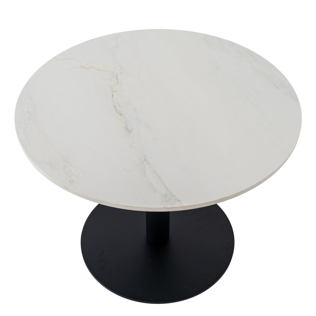 A round dining table with a white marble-patterned top and a matte black pedestal base, shown on a plain white background.