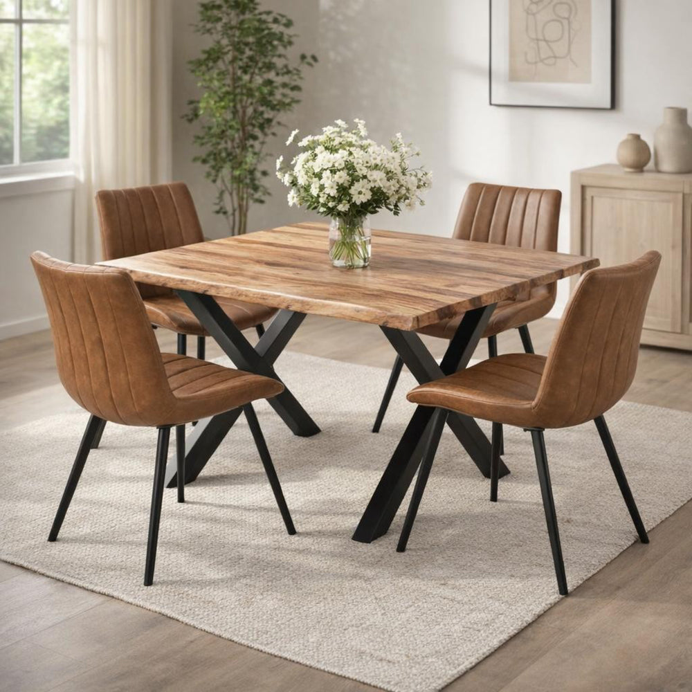 Dining room with wooden table and chairs on a rug