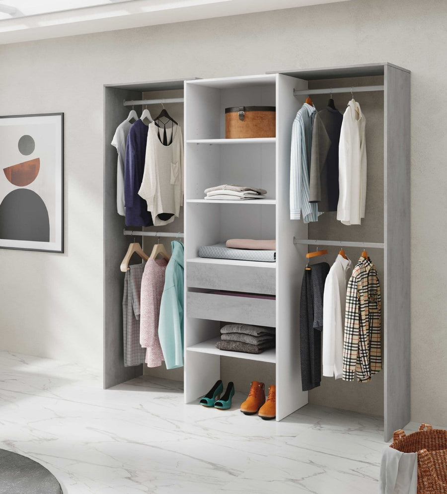Closet with clothes and shoes on shelves in a room with a white floor and light-colored walls.