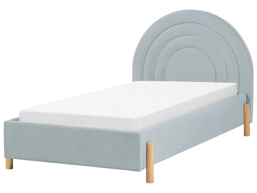 Light blue bed with wooden legs on a white background