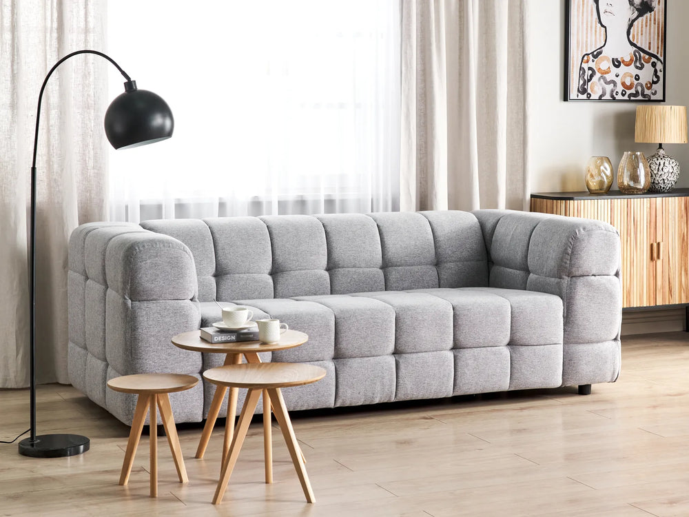 Light grey fabric three seater sofa with soft comfortable seating