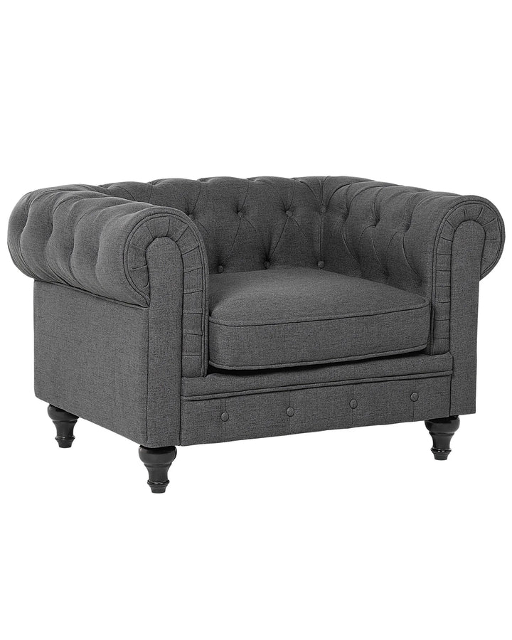 Gray tufted armchair on a white background