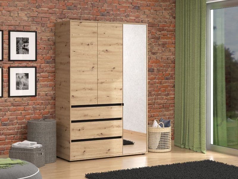 Wooden wardrobe with mirror against a brick wall with decorative elements.